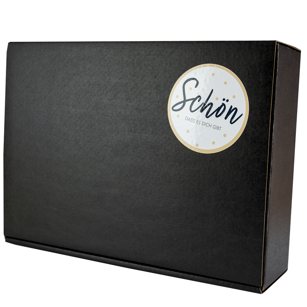 Schwarzer Geschenkkarton mit "Schön, dass es dich gibt" Sticker